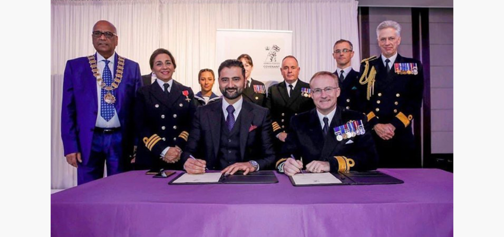 CEO Suleman Raza signs the Armed Forces Covenant with Rear Admiral Mike Bath from the Royal Navy 15 CEO Suleman Raza signs the Armed Forces Covenant with Rear Admiral Mike Bath from the Royal Navy